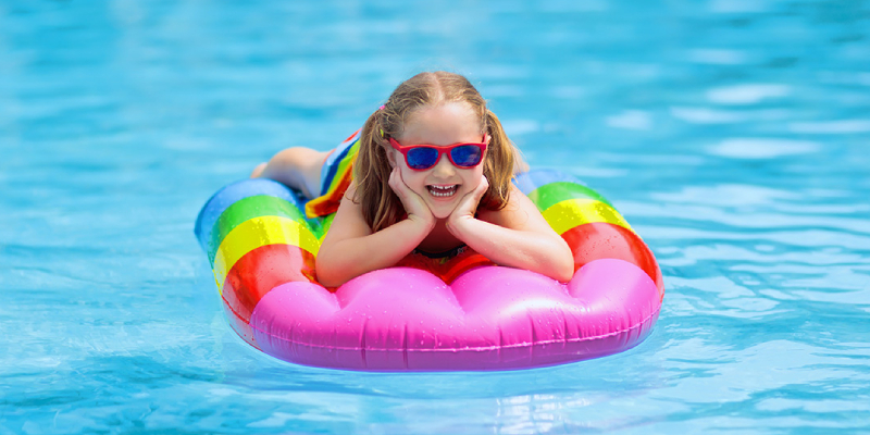 Beautiful long hair female model posing on swimming pool Stock Photo |  Adobe Stock