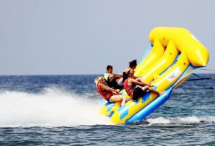 Happy People Having Fun On Water Boats In The Sea.