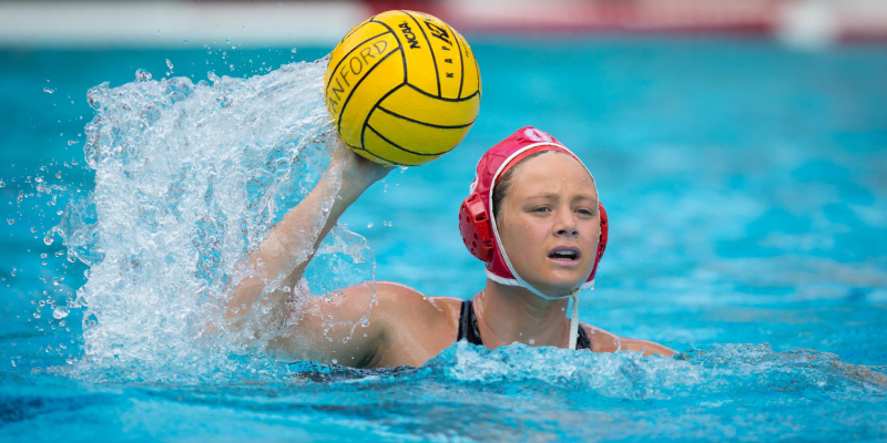 A Female Water Polo Player In An Action.