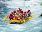 Group of People Having Fun During River Rafting.