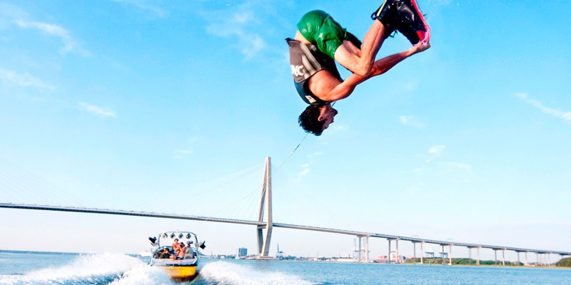 An Image Representing Flyboarding of A man.