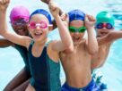 Cute Little Boys Enjoying While Swimming.