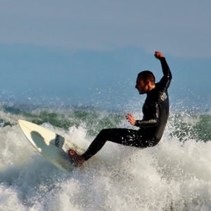 A Man Enjoying Water Skating.