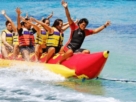 A Group of Fun People Playing In The Beach.