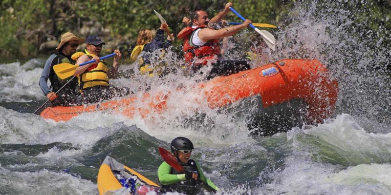 Adventurous Sports - River Rafting By Group of People.