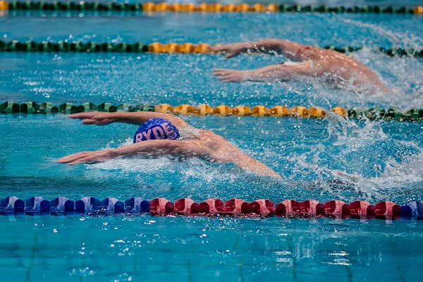 Swimmers swimming in a pool